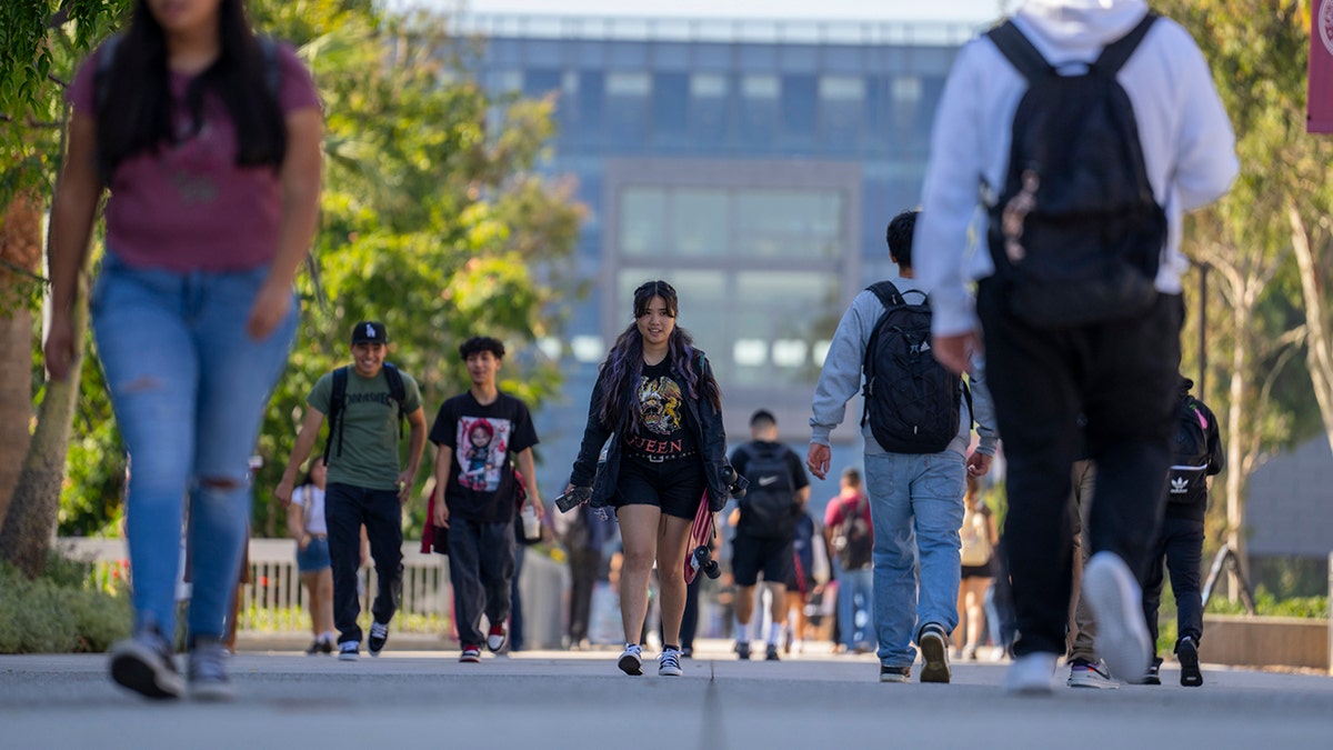 Students walk on a college campus