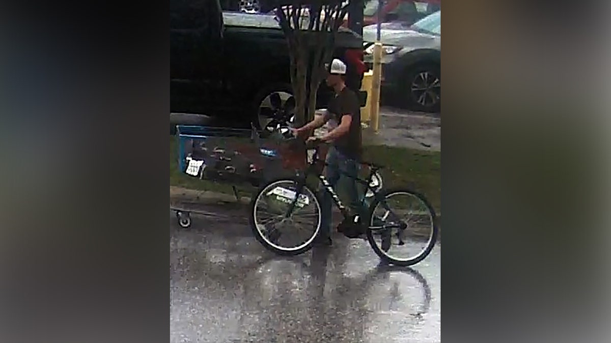 Caden Speight seen with a bicycle