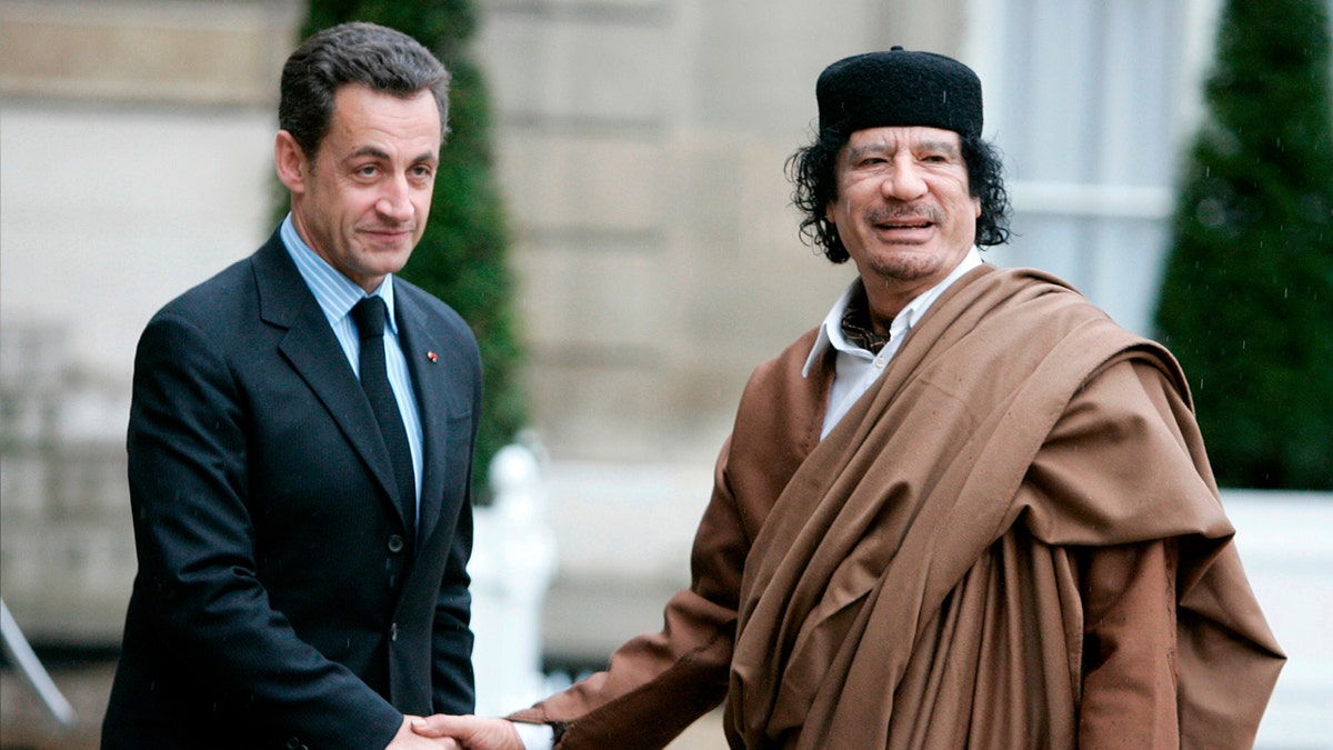 Sarkozy and Nicolas Sarkozy, left, and Libyan leader Col. Moammar Gadhafi