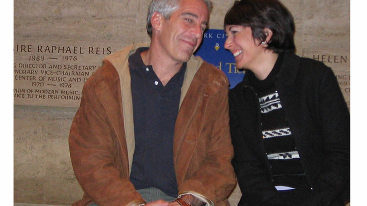 Jeffrey Epstein and Ghislaine Maxwell smile together