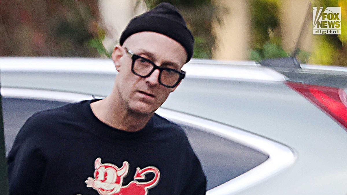 UNC Redneck Revolt professor Dwayne Dixon in a hat and glasses