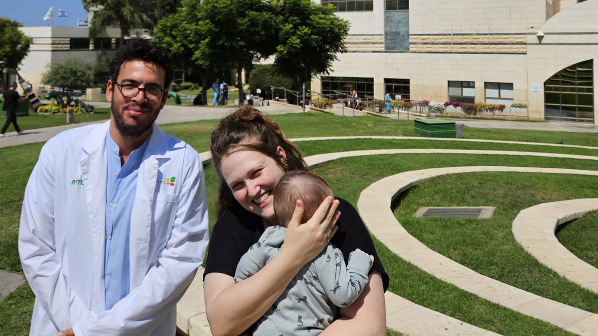 Hadas Levy, her son and Dr. Eran Altman, director of the sperm bank at the men’s infertility clinic at Beilinson Hospital, Israel.