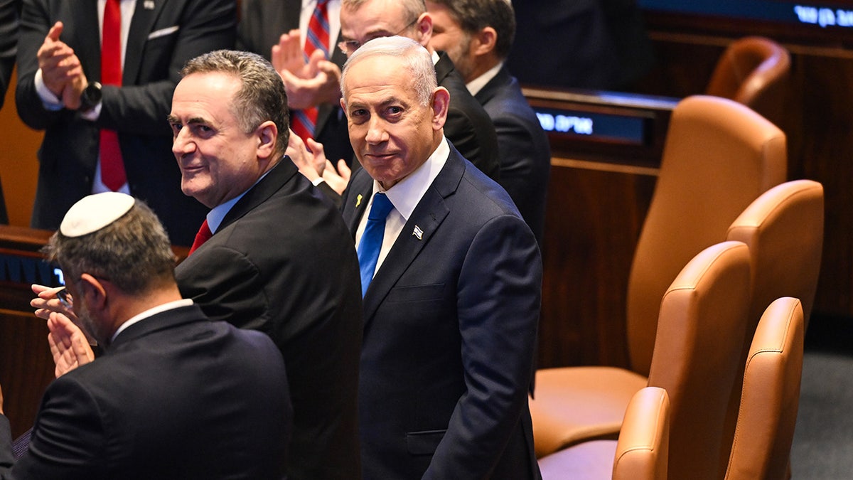 Israeli Prime Minister Benjamin Netanyahu seen as U.S. President Donald Trump prepares to deliver remarks to the Knesset.