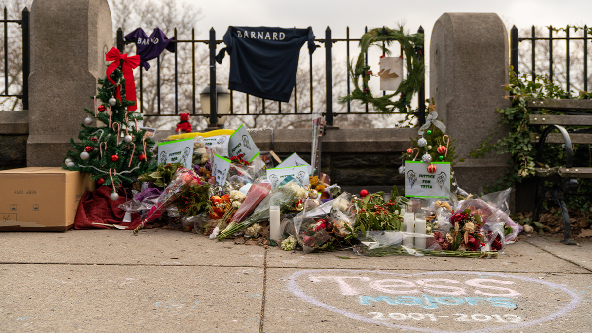 Flowers, Christmas trees and Barnard College items are placed at a makeshift memorial for Tessa Majors, the 18-year-old Virginia student killed in Manhattan in a violent knifepoint robbery
