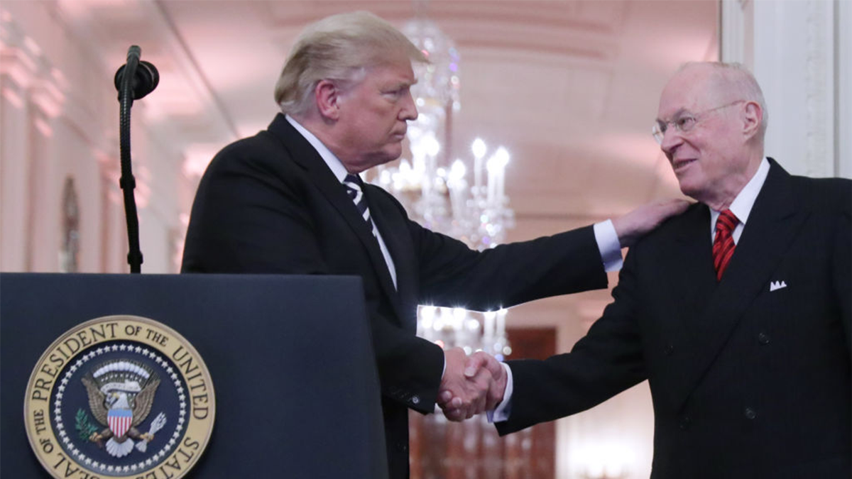 President Donald Trump shakes hands with retired Justice Anthony Kennedy during the ceremonial swearing in of Associate Justice Brett Kavanaugh in the East Room of the White House Oct. 8, 2018, in Washington, D.C.