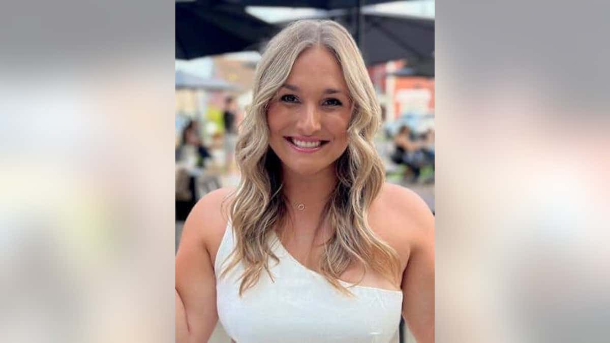 Rachel Noel Dumovich, 29, in a one-shoulder white top.