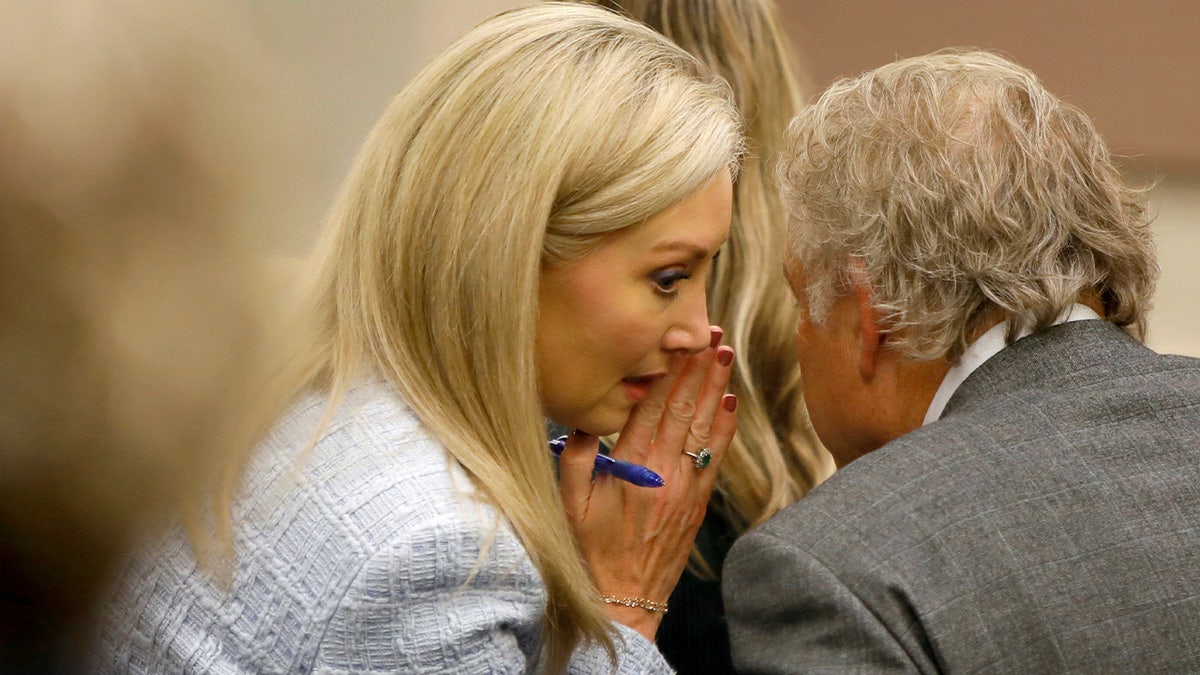 Abby Zwerner's attorney Diane Toscano whispers with her colleague Jeffrey Breit.