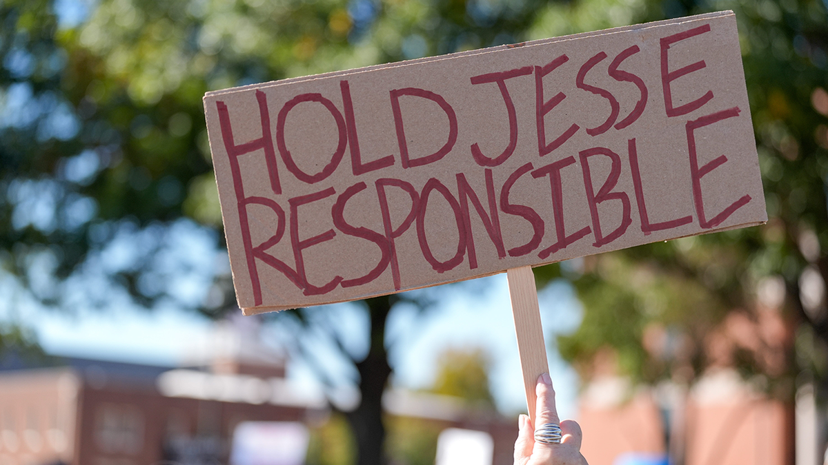 Jesse Butler protest sign