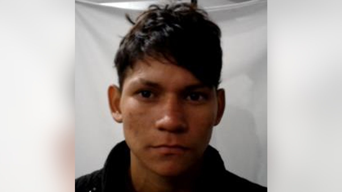 Juan Morales-Martinez poses for a booking picture.