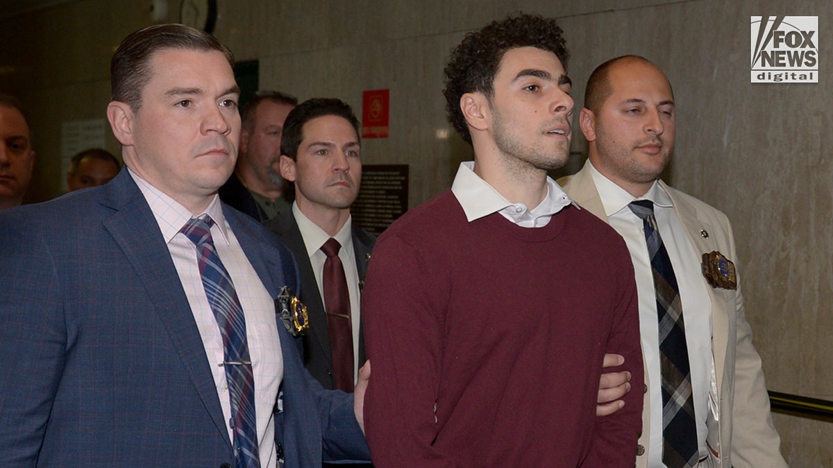 Luigi Mangione enters the courtroom in New York City Criminal Court