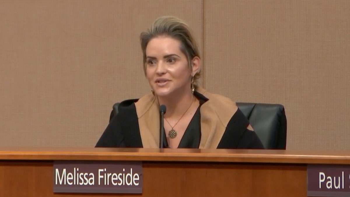 Former Clackamas County Commissioner Melissa Fireside sits at a meeting.