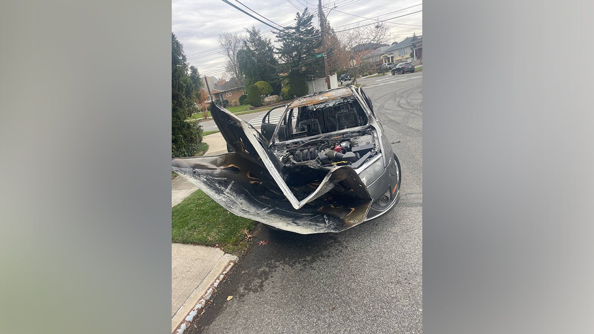 A vehicle set on fire during a street takeover in New York City