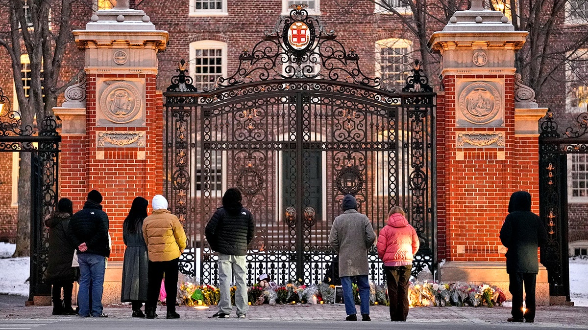 makeshift memorial for the victims at Van Wickle Gate at Brown University