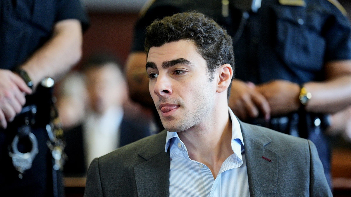 Luigi Mangione sits in court.