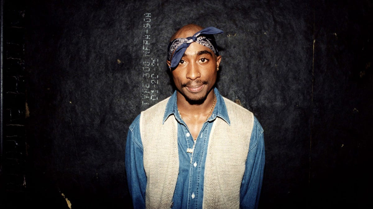 Tupac Shakur wearing bandana