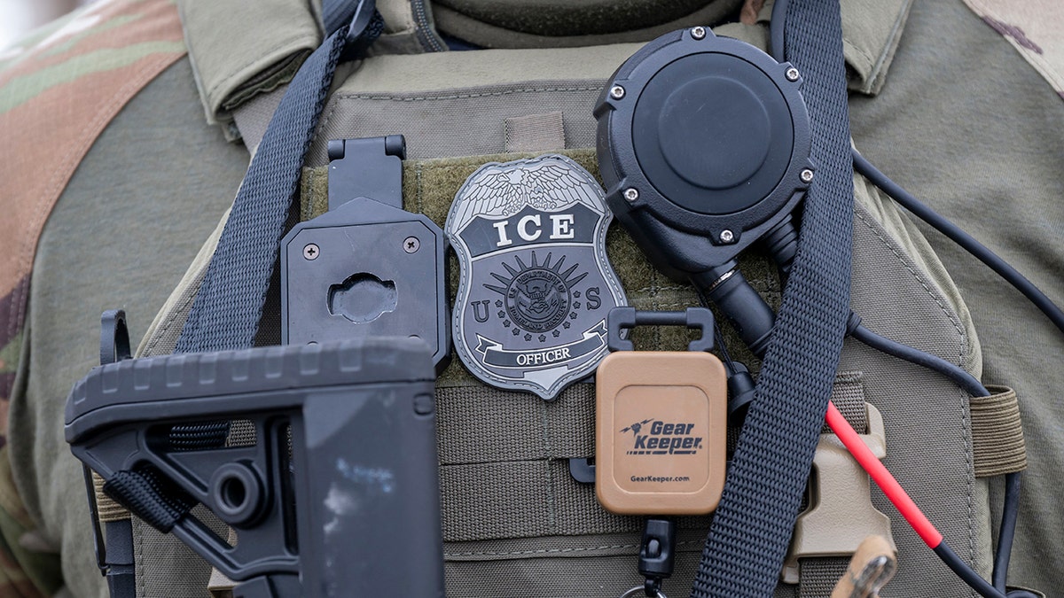 ICE officer badge closeup