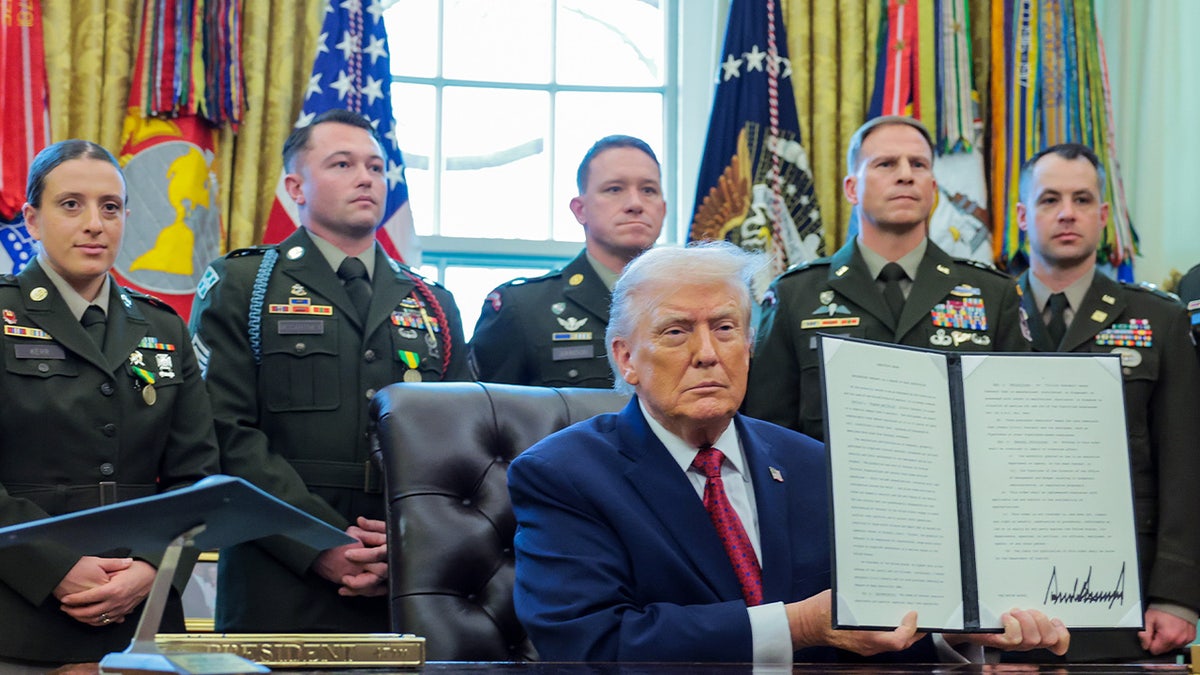 Trump with WMD executive order in the White House