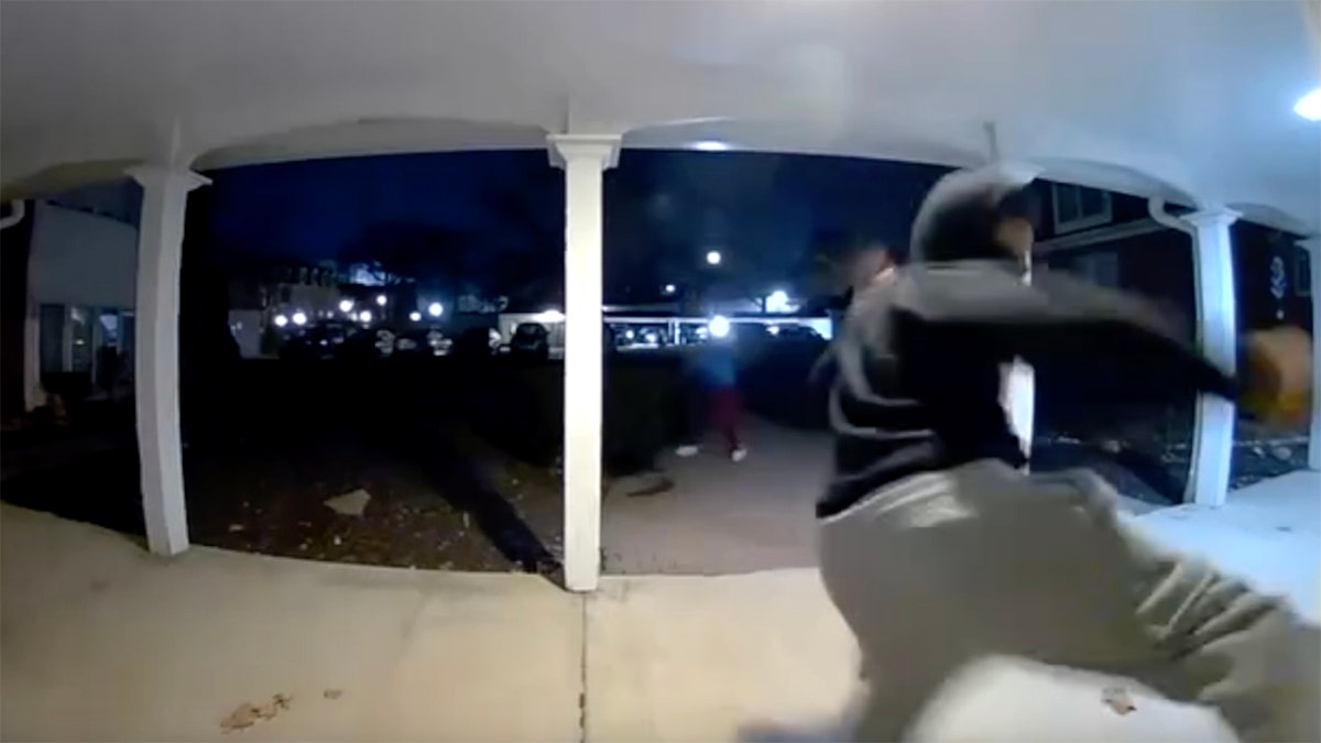 Surveillance footage shows teens partaking in the viral "Door Kick Challenge"