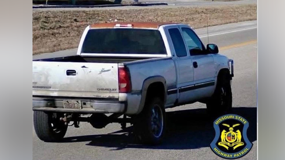 White 2001 Chevy Silverado linked to Missouri deputy shooting.