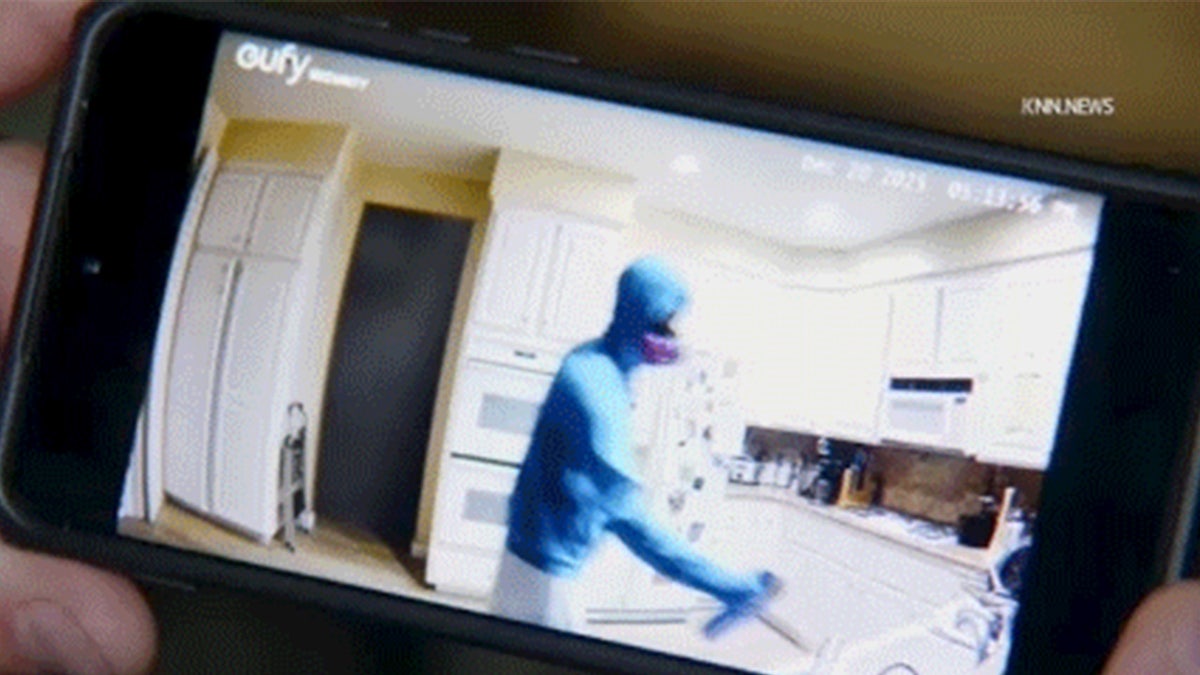 Suspect caught on surveillance footage spraying food