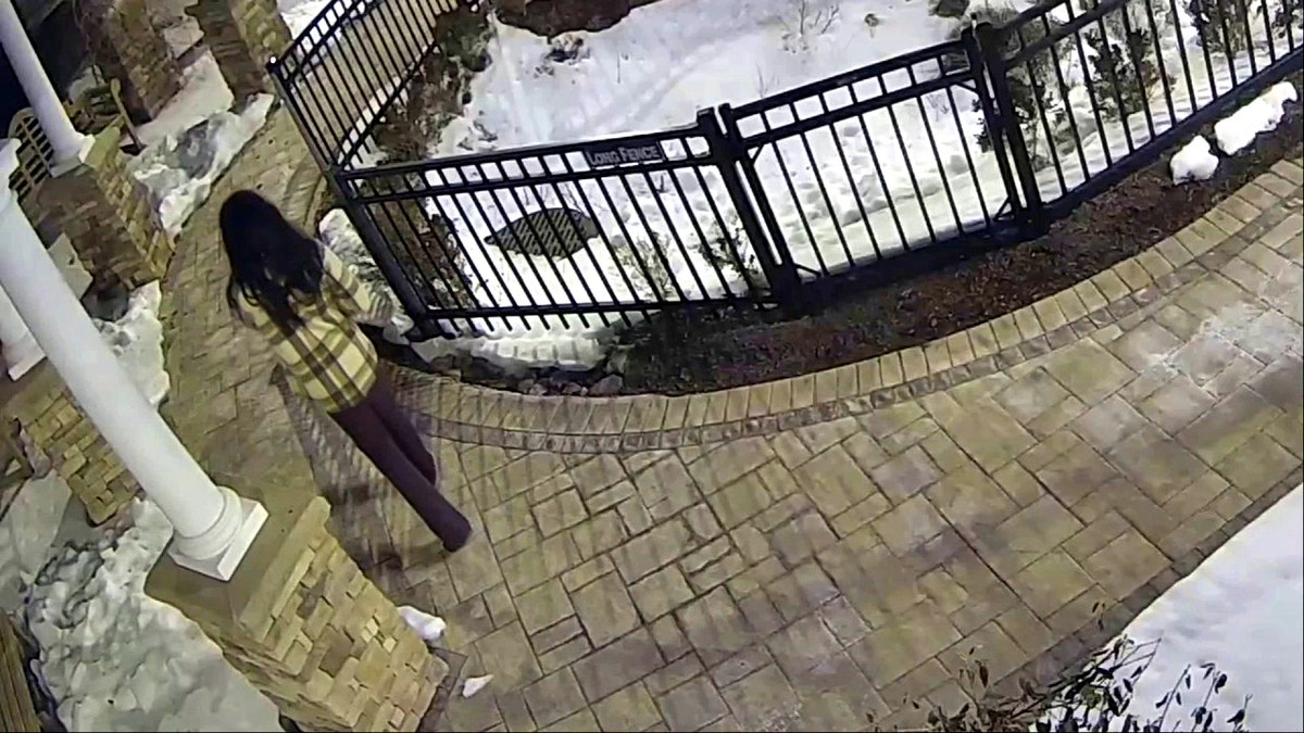 an individual walking outside near assisted living facility