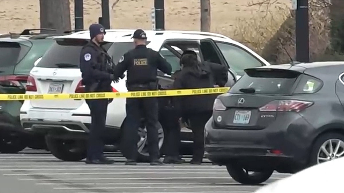 Police inspect vehicle near U.S. Capitol Building