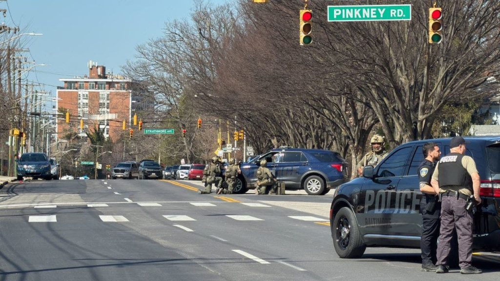 Baltimore police officer shot in the leg, suspect killed in apparent hostage incident