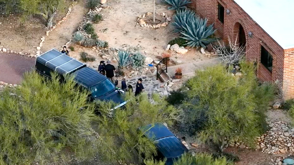 Aerial shot of investigators at Nancy Guthrie home.