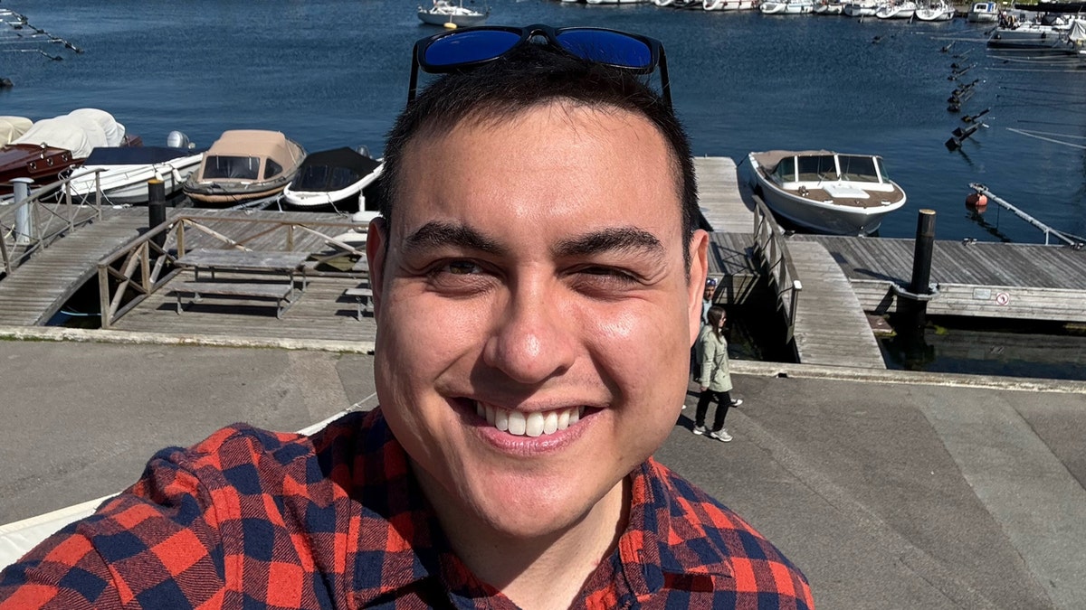 Jared Llamado smiling in a selfie.