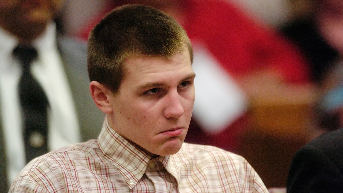 A close-up of Torey Adamcik crying in court.